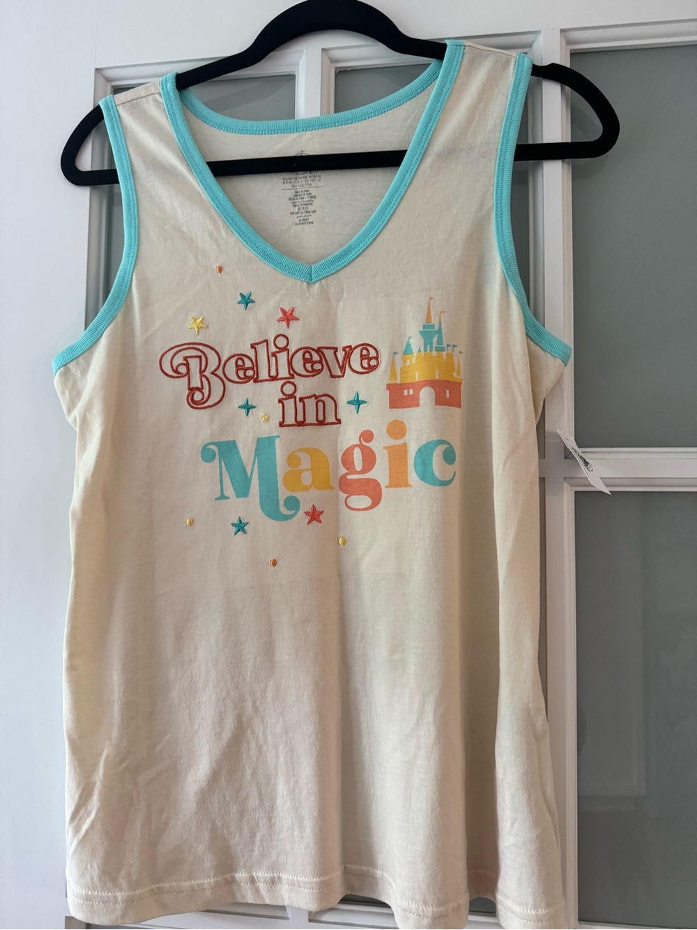 Disney Cream Tank with Aqua Trim and Colorful "Believe in Magic" Print
